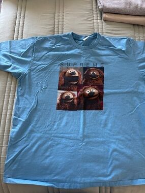 Supreme Light Blue Short-Sleeve Tee with Four-Panel Puppet Graphic